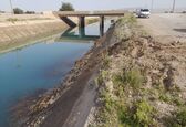 رفع نشتی از کانال اصلی شبکه آبیاری گتوند