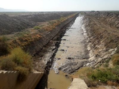حوضچه رسوبگیر شبکه آبیاری شهید رجایی امیدیه لایروبی شد