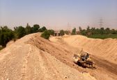 عملیات اجرایی تعریض و بازسازی کانال سیل بر منطقه پای پل شهرستان اندیمشک آغاز شد